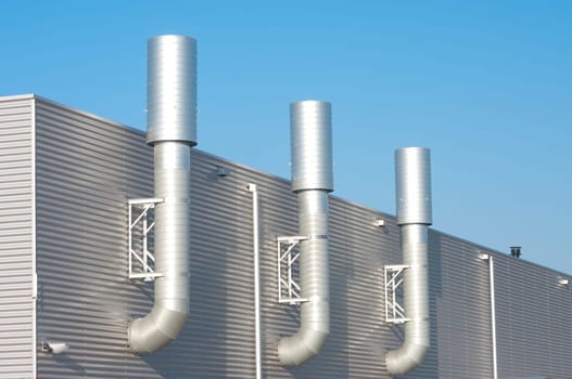 three chimneys on an industrial building