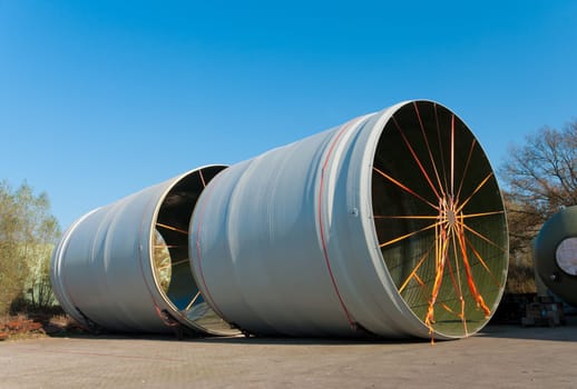 large pvc tubes placed outside for futher transport