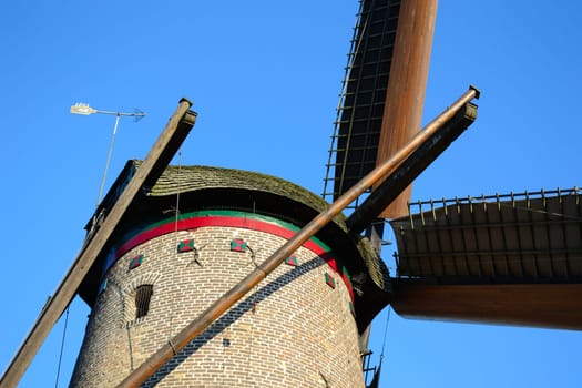 Windmill with tensioned sails