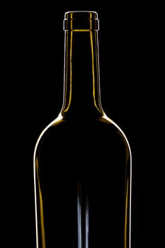 green wine bottle shiny against black background