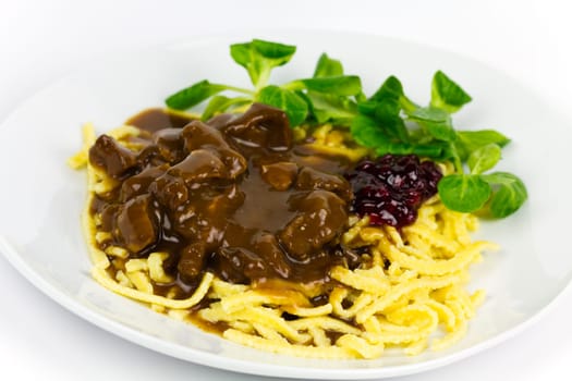 Venison ragout with spaetzle,cream,cranberries,lamb's lettuce