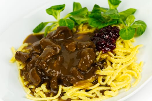 Venison ragout with spaetzle,cream,cranberries,lamb's lettuce