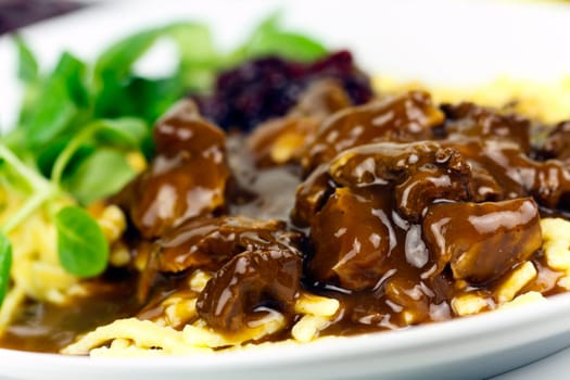 Venison ragout with spaetzle,cream,cranberries,lamb's lettuce