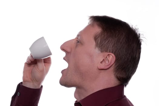 A man drank a cup of espresso