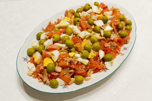 salad, tomato, egg, tuna. Typical Mediterranean salad