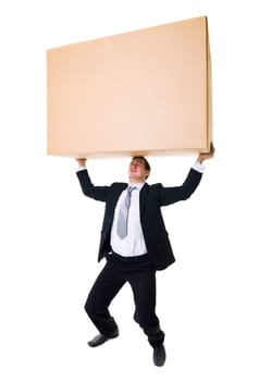 Well dressed man carrying a heavy cardboard Box isolated on white background