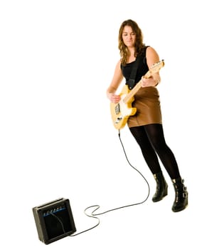 Young woman playing electric guitar isolated on white background