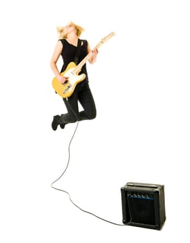 Young woman playing electric guitar isolated on white background