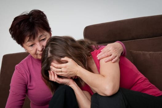 Problems - senior mother comforts daughter