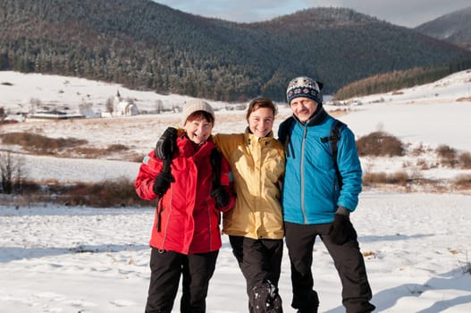 Family in winter together - portrait