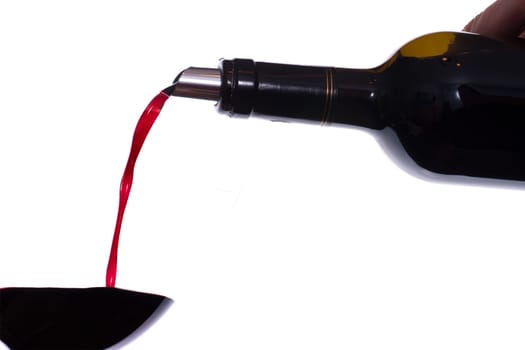Wine is poured into a glass