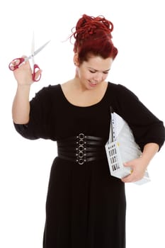 Smiling red-haired accountant with scissors and a folder with documents isolated on white background