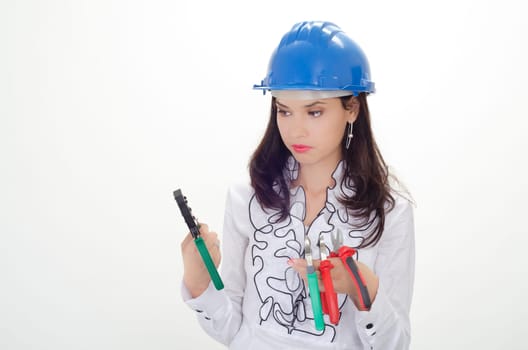Young business woman chooses the proper tool