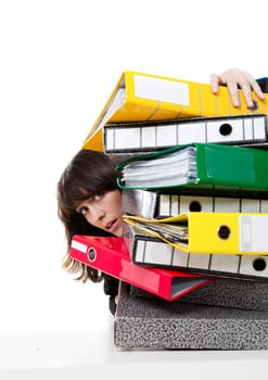Stressed female office worker with folders. Studio shot, isolated on white background