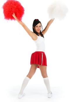 Young lady cheerleader posing in the studio, isolated on white