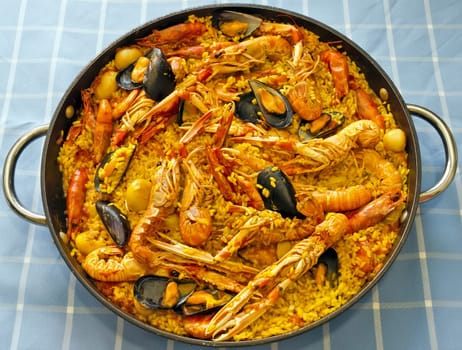 Tradition Seafood Spanish Paella in Pan, this is a typical spanish dish.