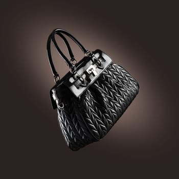 ladies handbag on  dark background