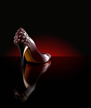 woman shoes on the dark background