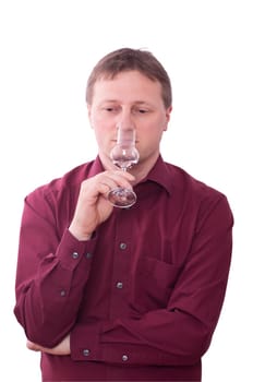 A man smells the scent of a grappa