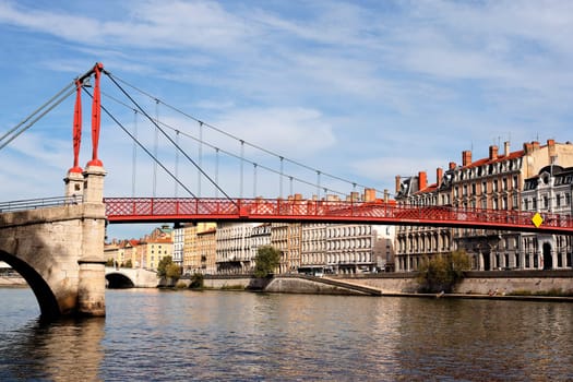 Lyon city with red footbridge in summer, France