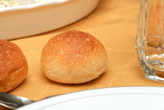 Bread dishes and glasses on the table