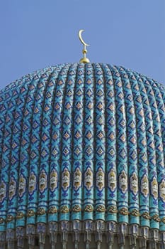The top of the tiled dome With Arabic mosaics of the ancient mosque in Saint Petersburg, Russia.