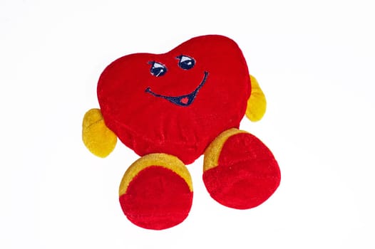 Plush heart on love on a white background