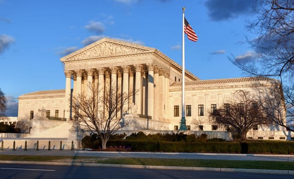Late afternoon winter sun illuminates front of supreme court in Washington in winter