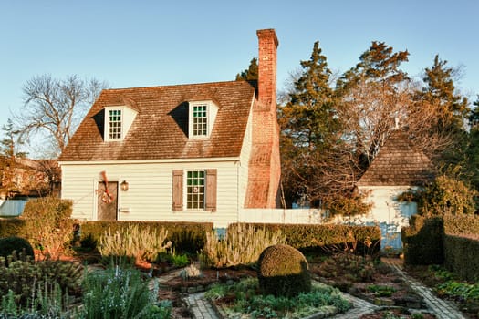 WILLIAMSBURG, VIRGINIA - DECEMBER 30: Sun rises on old house on December 30, 2011. Colonial Williamsburg&#039 s 301 acres includes many restored buildings and houses