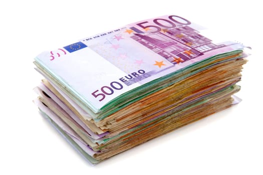 Big pile of euro bank notes isolated on white