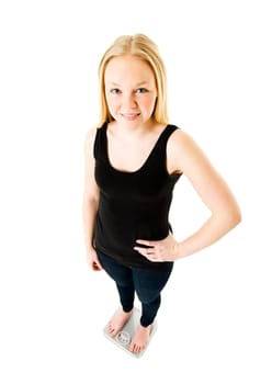 Young Girl on weight scale isolated on white background