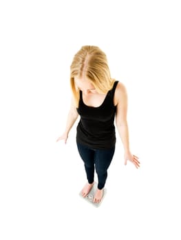 Young Girl on weight scale isolated on white background