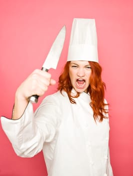 Female Chef on pink background