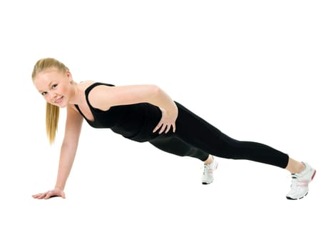 Young woman doing aerobics isolated on white background