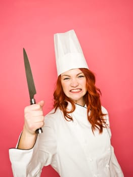 Female Chef on pink background