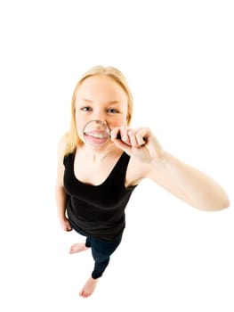 Girl with a Magnifying Glass in front of her mouth