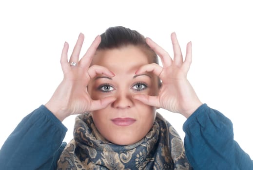 Young woman showing binoculars