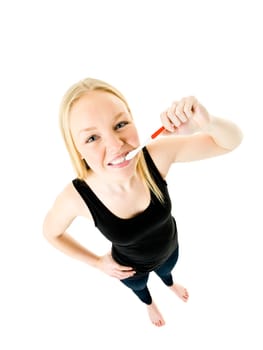 Young woman brushing teeths isolated on white background