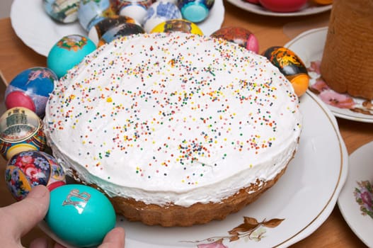 Easter cake and coloured eggs