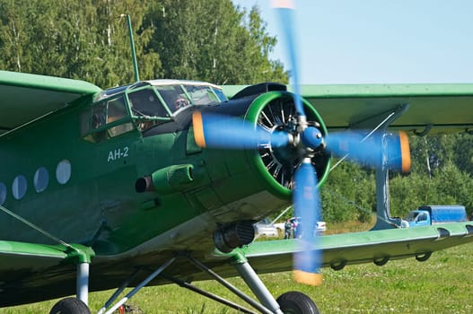 Biplane An-2 (Antonov) in the airshow. Mochishe aerodrome, Novosibirsk