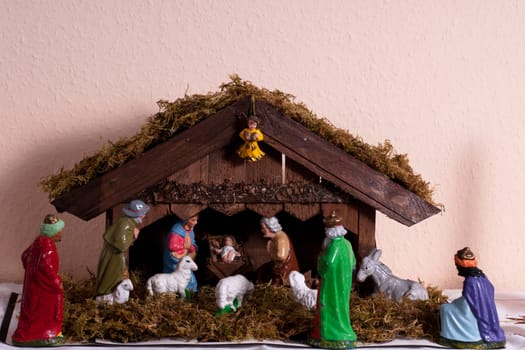 A Christmas group made of wood and painted wooden figures