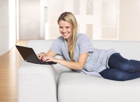Young woman with computer / notebook