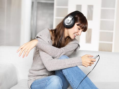 Young woman listening to music