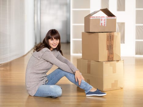 Young woman in her new apartment