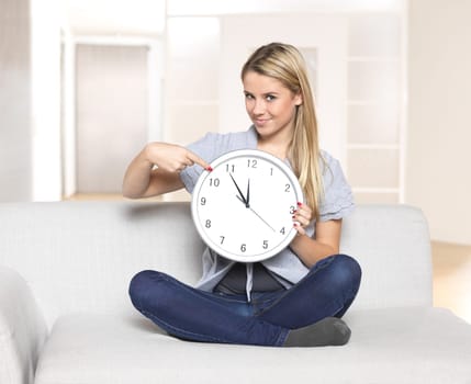 It's 5 to 12,Young Woman Pointing to Clock