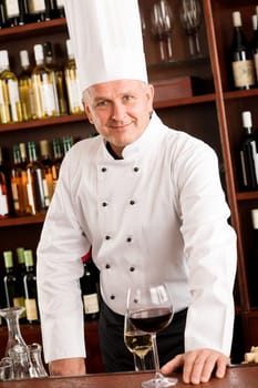 Chef cook wine bar professional standing confident in restaurant