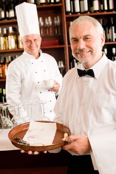 Chef cook drink coffee waiter serve on tray in restaurant