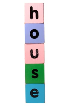 toy letters that spall house against a white background with clipping path