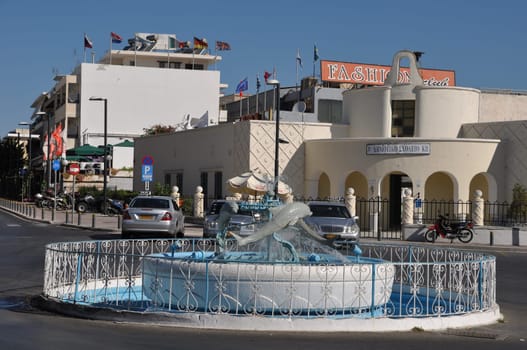 KOS - AUGUST 26 2010: famous dolphin square on August 26, 2010 in Kos, GREECE