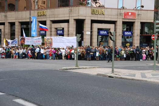 LISBON - MAY 11: 2010 portuguese crowd waiting for Pope Benedict XVI, born Joseph Alois Ratzinger is the 265th and reigning Pope, he succeeded Pope John Paul II on May 11, 2010 in Lisbon, Portugal.